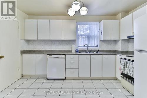 27 Dell Park Avenue, Toronto, ON - Indoor Photo Showing Kitchen With Double Sink