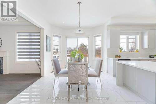 41 Leo Austin Road, Brampton, ON - Indoor Photo Showing Dining Room With Fireplace