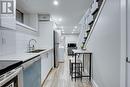 1 - 104 Wellington Street N, Hamilton, ON  - Indoor Photo Showing Kitchen With Double Sink 