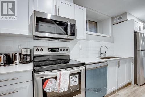 1 - 104 Wellington Street N, Hamilton, ON - Indoor Photo Showing Kitchen With Double Sink With Upgraded Kitchen