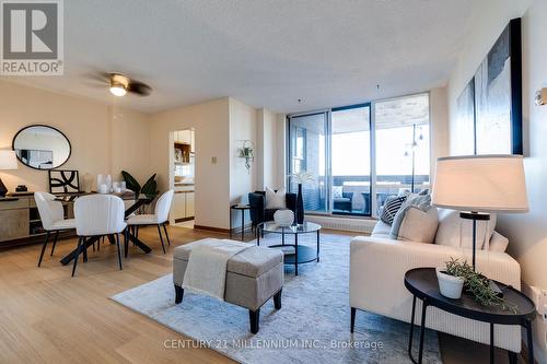 719 - 1625 Bloor Street E, Mississauga, ON - Indoor Photo Showing Living Room