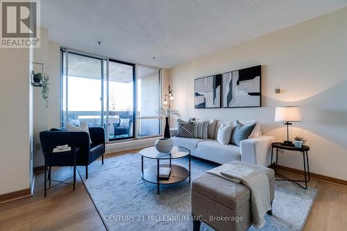 719 - 1625 Bloor Street E, Mississauga, ON - Indoor Photo Showing Living Room