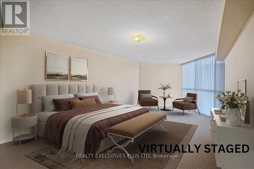 702 - 4235 Sherwoodtowne Boulevard, Mississauga, ON - Indoor Photo Showing Bedroom