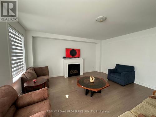 34 - 400 Finch Avenue, Pickering, ON - Indoor Photo Showing Living Room With Fireplace