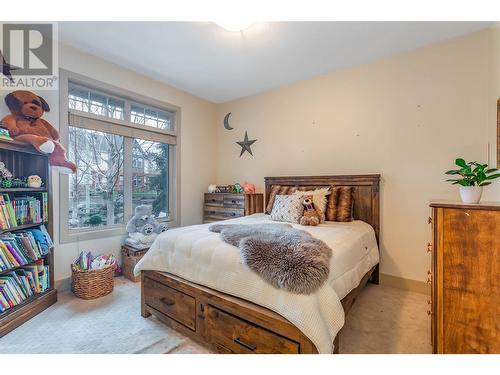 Main Level Den being used as a 5th BR - 558 Gowen Place, Kelowna, BC - Indoor Photo Showing Bedroom