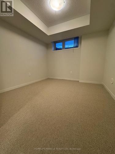 64 - 31 Honeycrisp Crescent, Vaughan, ON - Indoor Photo Showing Other Room