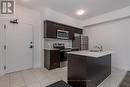 105 - 4 Spice Way, Barrie, ON  - Indoor Photo Showing Kitchen With Stainless Steel Kitchen 