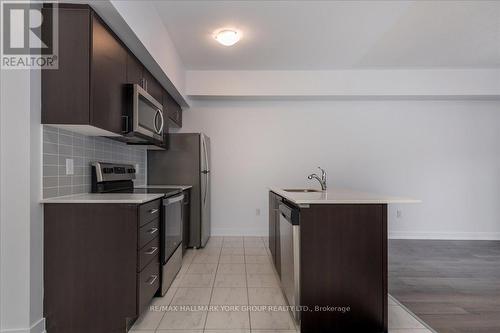 105 - 4 Spice Way, Barrie, ON - Indoor Photo Showing Kitchen