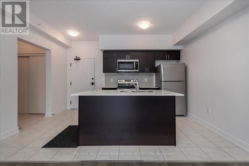 105 - 4 Spice Way, Barrie, ON - Indoor Photo Showing Kitchen