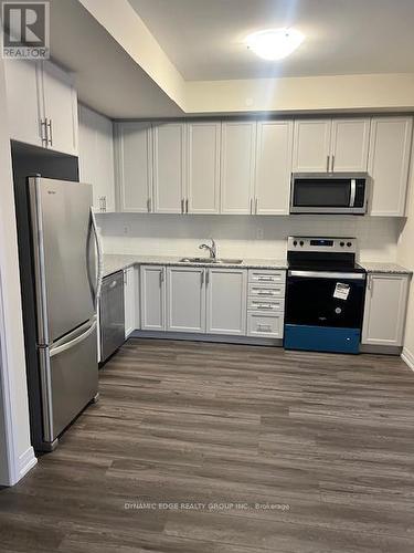 123 - 1593 Rose Way, Milton, ON - Indoor Photo Showing Kitchen With Stainless Steel Kitchen