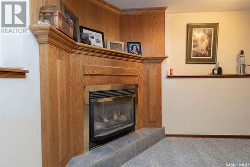 118 Adolph Crescent, Saskatoon, SK - Indoor Photo Showing Living Room With Fireplace