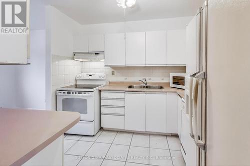 94 - 14 London Green Court, Toronto, ON - Indoor Photo Showing Kitchen With Double Sink