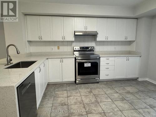 9 - 5005 Oscar Peterson Boulevard, Mississauga, ON - Indoor Photo Showing Kitchen