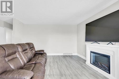 18 Palmer Road, Hamilton, ON - Indoor Photo Showing Living Room With Fireplace