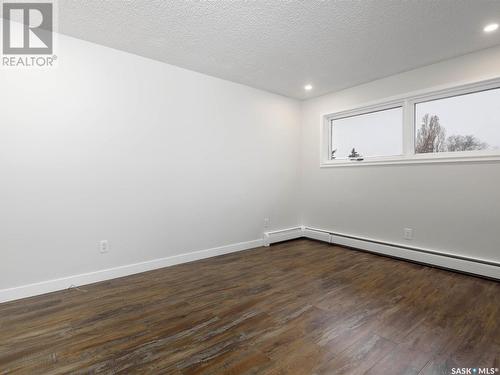 122 Hawkes Bay, Regina, SK - Indoor Photo Showing Other Room