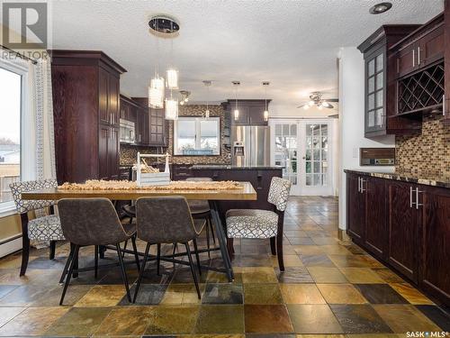 122 Hawkes Bay, Regina, SK - Indoor Photo Showing Dining Room