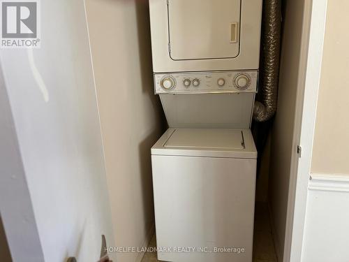 2011 - 633 Bay Street, Toronto, ON - Indoor Photo Showing Laundry Room