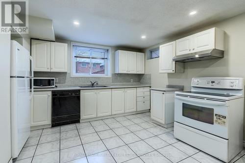 Bsmnt - 5062 Terry Fox Way, Mississauga, ON - Indoor Photo Showing Kitchen With Double Sink