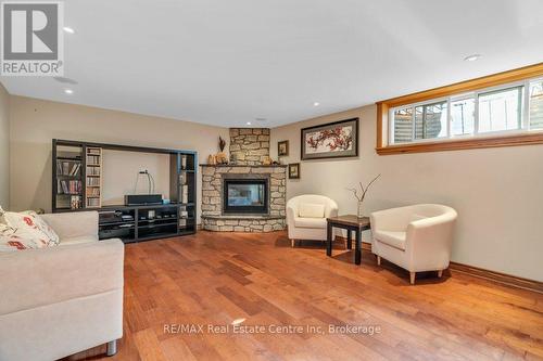 19 Promenade Road, Guelph/Eramosa, ON - Indoor Photo Showing Living Room With Fireplace