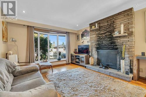 19 Promenade Road, Guelph/Eramosa, ON - Indoor Photo Showing Living Room With Fireplace