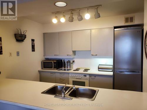 1602 - 50 Eglinton Avenue W, Mississauga, ON - Indoor Photo Showing Kitchen With Double Sink