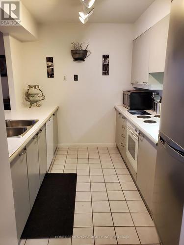 1602 - 50 Eglinton Avenue W, Mississauga, ON - Indoor Photo Showing Kitchen With Double Sink