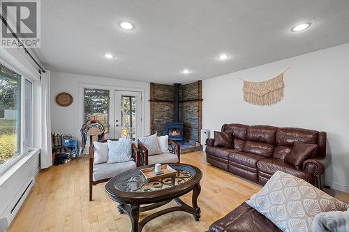 2315 16Th Street, Lister, BC - Indoor Photo Showing Living Room With Fireplace