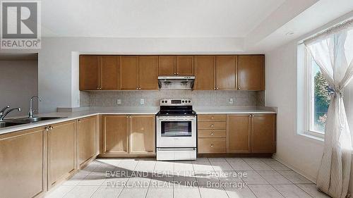 268 - 4975 Southampton Drive, Mississauga, ON - Indoor Photo Showing Kitchen With Double Sink