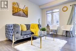 Living area featuring dark hardwood / wood-style flooring - 