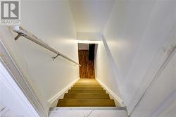 Stairs featuring wood-type flooring - 