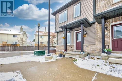 View of snow covered property entrance - 350 Dundas Street S Unit# 30, Cambridge, ON - Outdoor