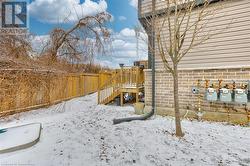 View of yard layered in snow - 