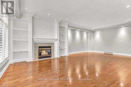 9 - 88 Lakeport Road, St. Catharines, ON - Indoor With Fireplace