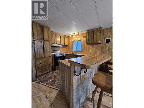 18 5378 Park Drive, 100 Mile House, BC - Indoor Photo Showing Kitchen