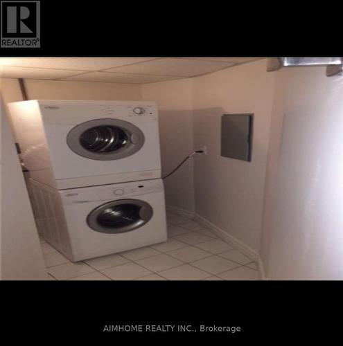 1013 - 38 Elm Street, Toronto, ON - Indoor Photo Showing Laundry Room