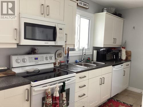 1209 Fatima Street, Cornwall, ON - Indoor Photo Showing Kitchen With Double Sink