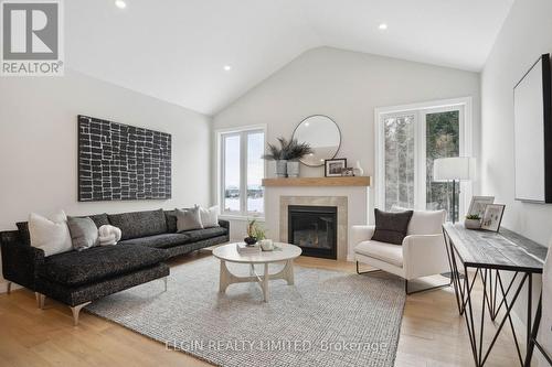 128 Graydon Drive, South-West Oxford (Mount Elgin), ON - Indoor Photo Showing Living Room With Fireplace