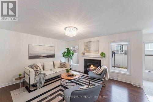 580 Sunlit Circle, Ottawa, ON - Indoor Photo Showing Living Room With Fireplace