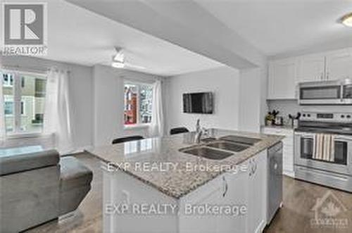 128 Gelderland Private, Ottawa, ON - Indoor Photo Showing Kitchen With Stainless Steel Kitchen With Double Sink With Upgraded Kitchen