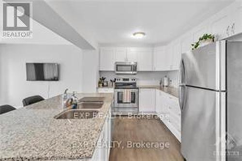 128 Gelderland Private, Ottawa, ON - Indoor Photo Showing Kitchen With Stainless Steel Kitchen With Double Sink With Upgraded Kitchen