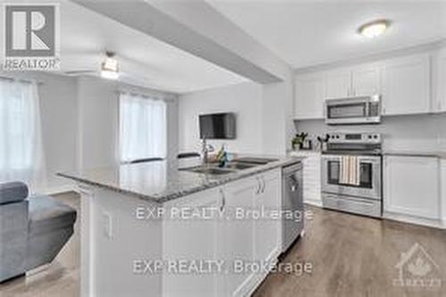 128 Gelderland Private, Ottawa, ON - Indoor Photo Showing Kitchen With Stainless Steel Kitchen With Double Sink