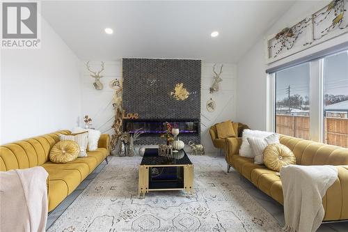 59 Clara Crescent, Chatham, ON - Indoor Photo Showing Living Room With Fireplace