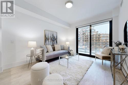 320 - 118 Merchants' Wharf, Toronto, ON - Indoor Photo Showing Living Room