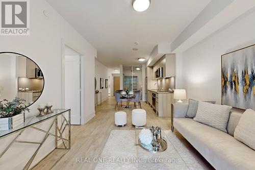 320 - 118 Merchants' Wharf, Toronto, ON - Indoor Photo Showing Living Room