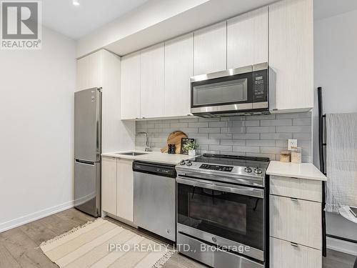 422 - 1401 O'Connor Drive, Toronto, ON - Indoor Photo Showing Kitchen With Stainless Steel Kitchen