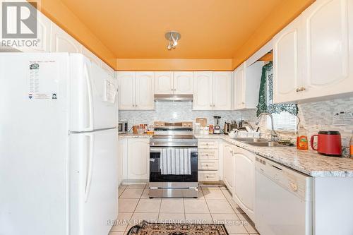 77 Winners Circle, Brampton, ON - Indoor Photo Showing Kitchen With Double Sink