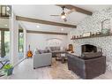 2455 Maquinna Road, Kelowna, BC  - Indoor Photo Showing Living Room With Fireplace 