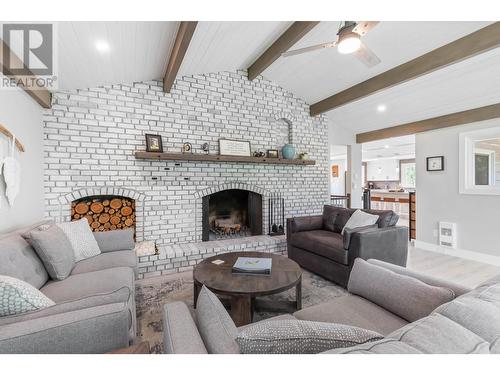 2455 Maquinna Road, Kelowna, BC - Indoor Photo Showing Living Room With Fireplace