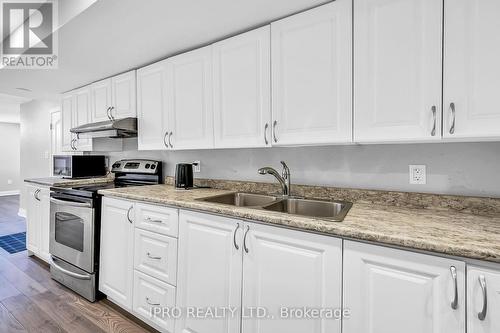 286 Dalgleish Trail, Hamilton, ON - Indoor Photo Showing Kitchen With Double Sink