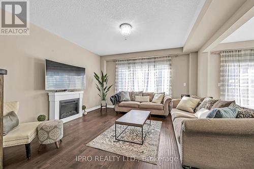 286 Dalgleish Trail, Hamilton, ON - Indoor Photo Showing Living Room With Fireplace